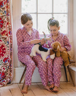 Pyjamas kids under a star